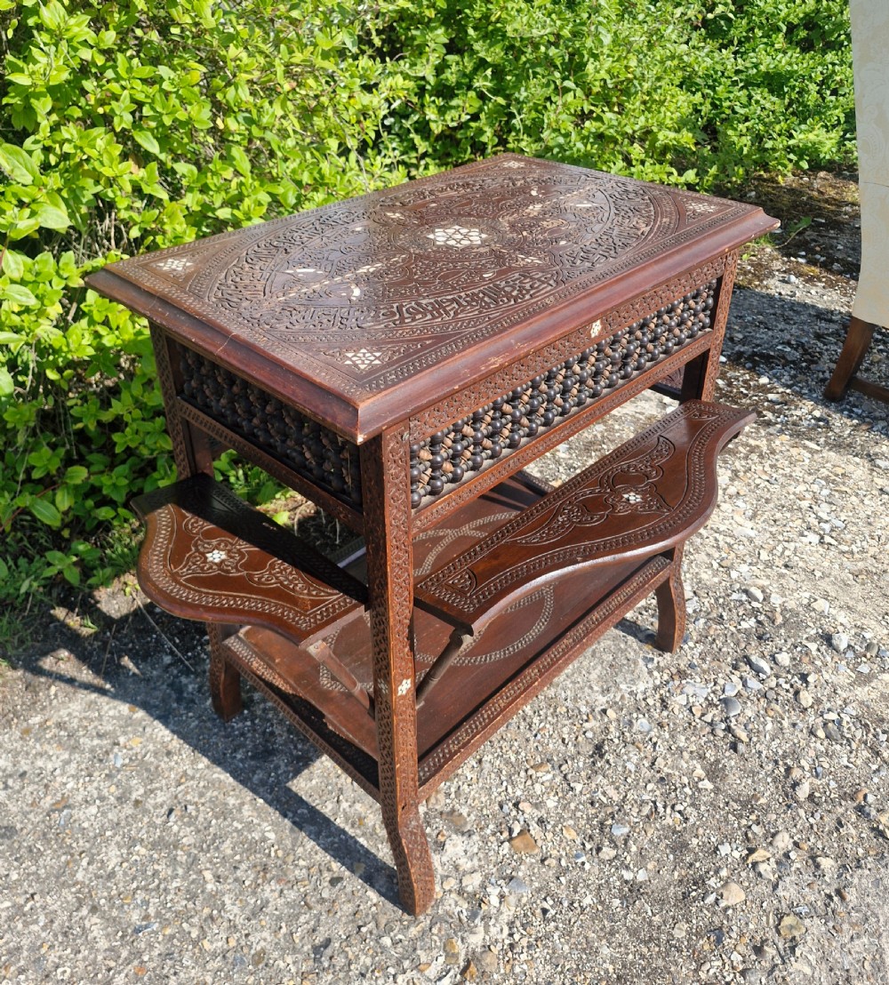 Moorish occasional table with drop sides. View II