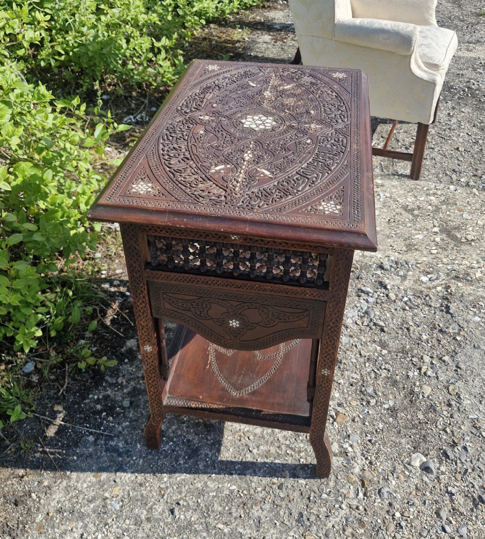 Moorish occasional table with drop sides. View III