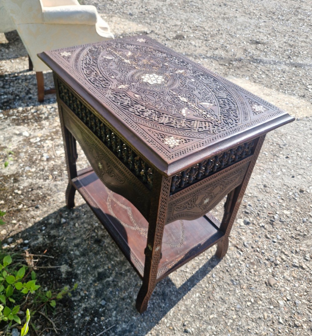 Moorish occasional table with drop sides. View IV