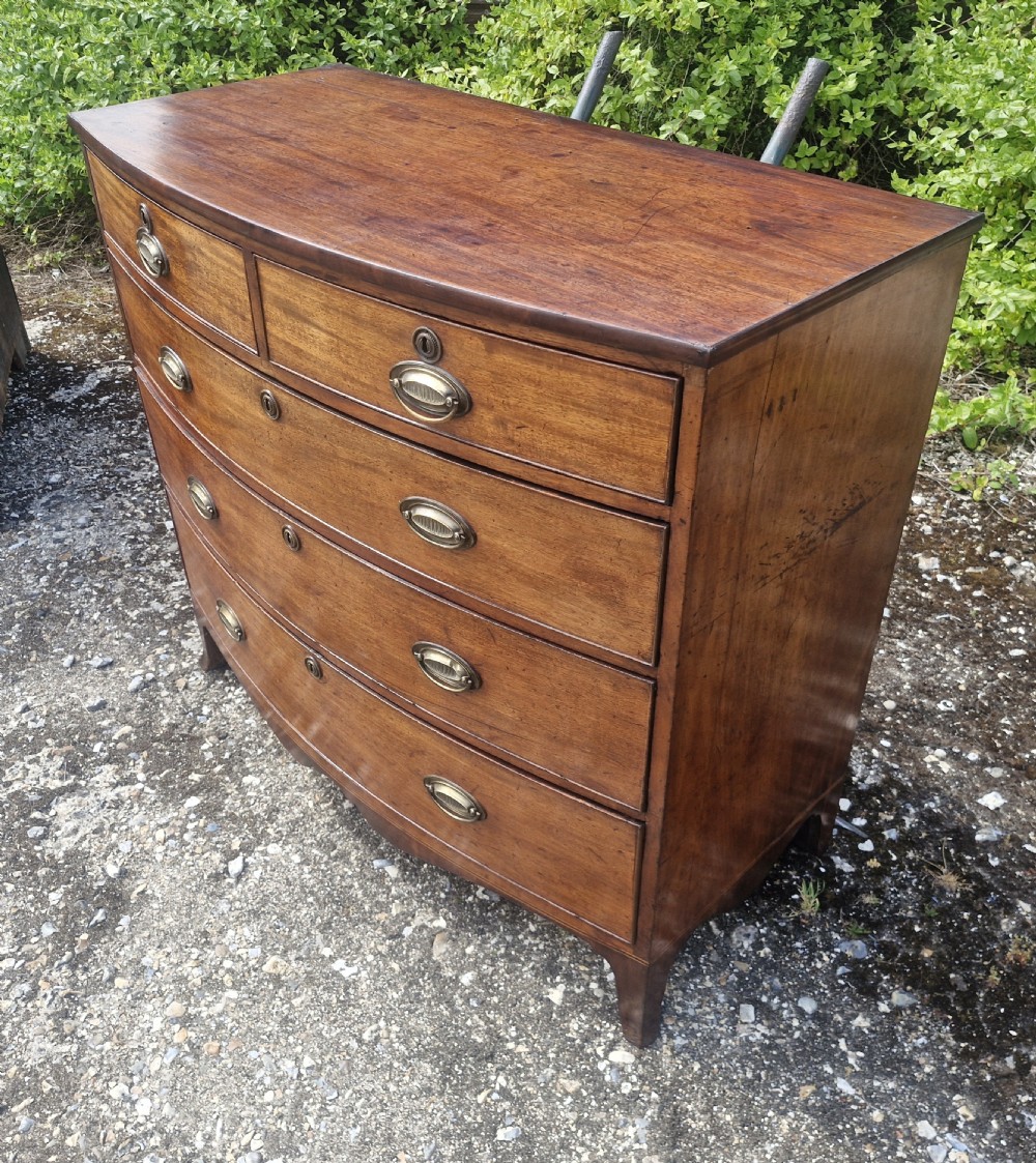 Regency mahogany bow front chest of drawers.  View IV