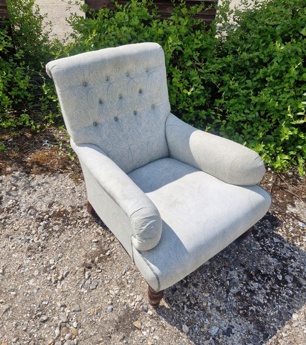 Upholstered button back armchair.  View IV