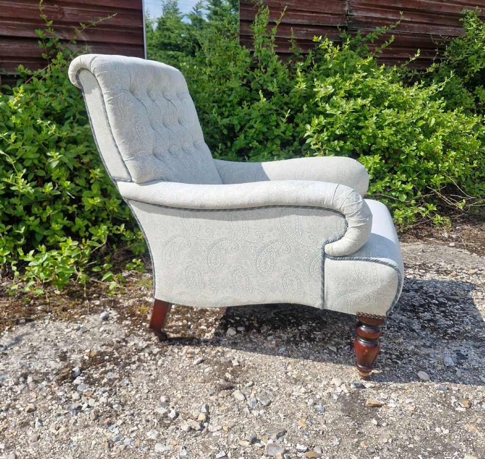 Upholstered button back armchair.  View VI