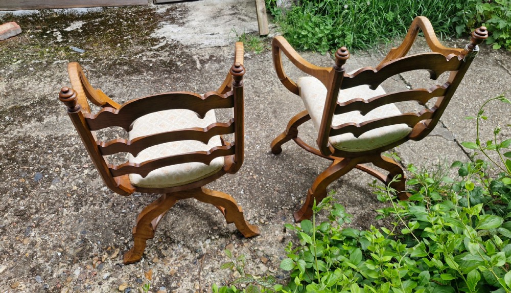 Pair of Victorian armchairs after a Gillows design, makers name. View II