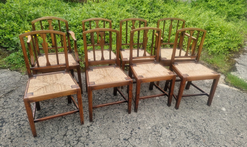 Set of 8 East Anglian rush seat dining chairs. 