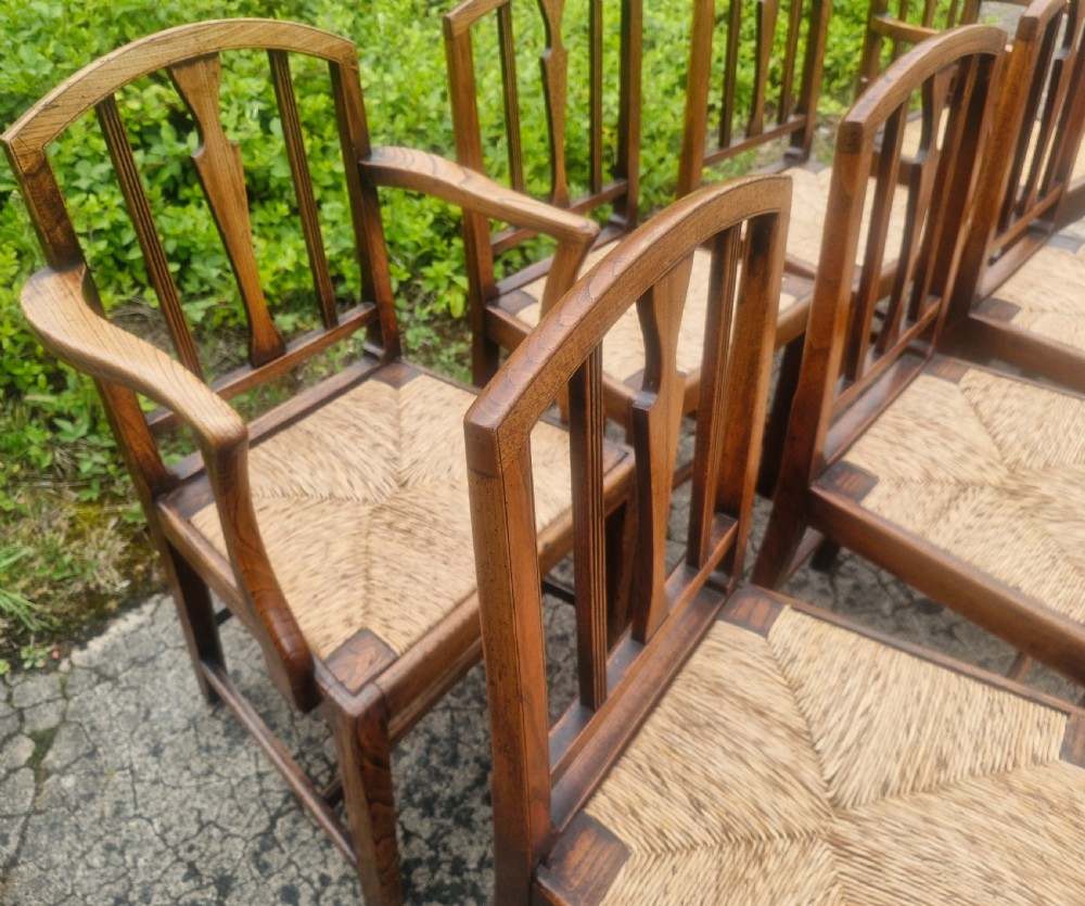 Set of 8 East Anglian rush seat dining chairs.  View V