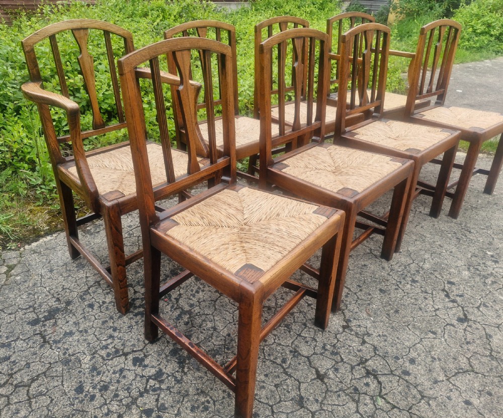 Set of 8 East Anglian rush seat dining chairs.  View VI