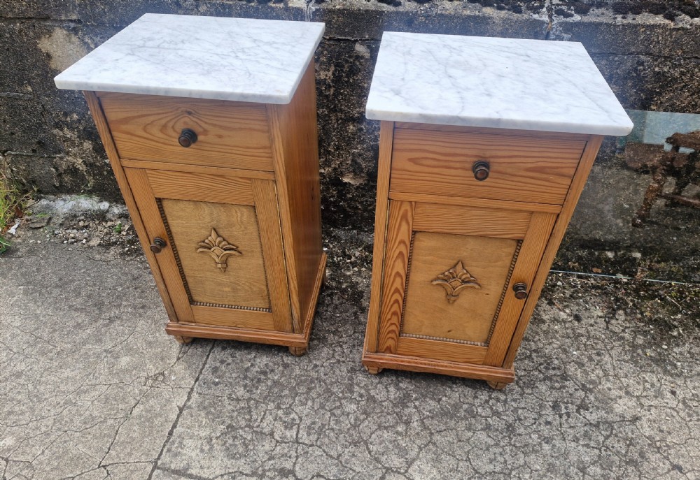 Pair of pine marble top bedside cabinets. 