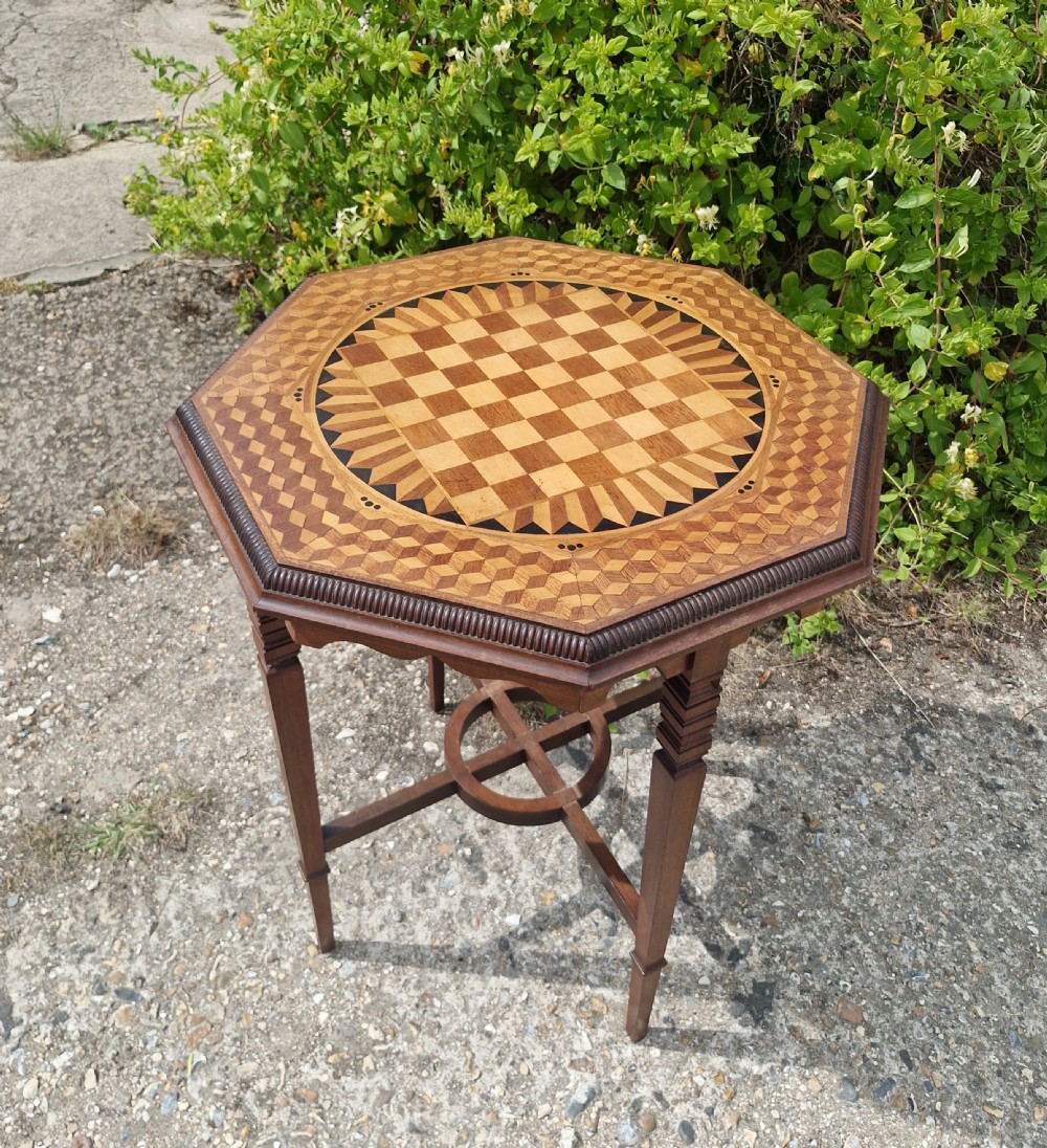 Late Victorian inlaid and parquetry games table. 