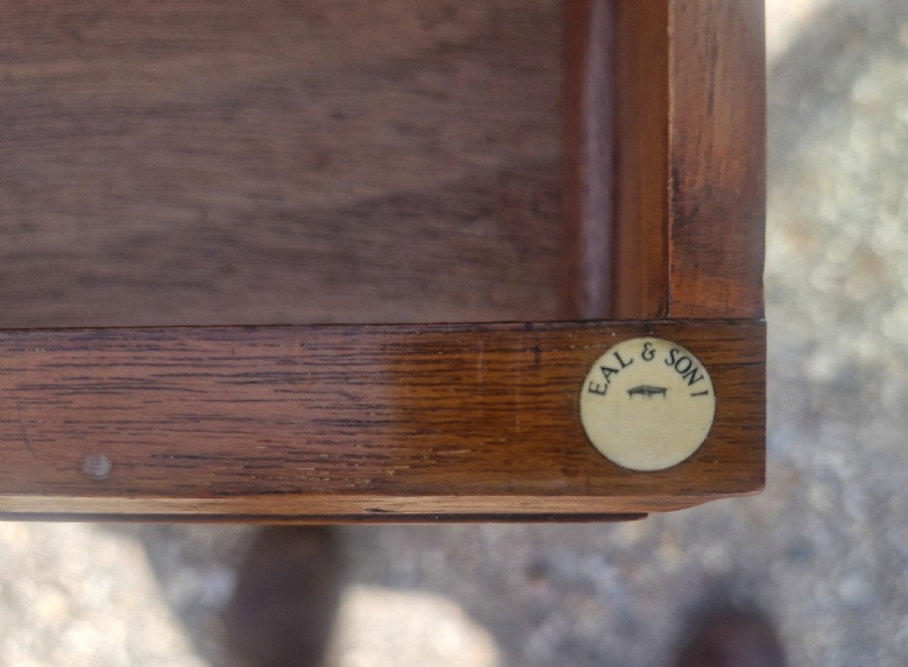 Walnut kneehole pedestal writing desk by Heals. View IV