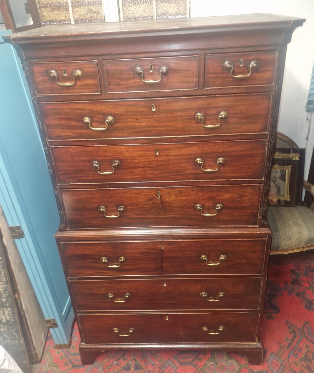 A late Georgian dark mahogany tallboy chest on chest with brass swan-neck handles and bracket feet. View XIV
