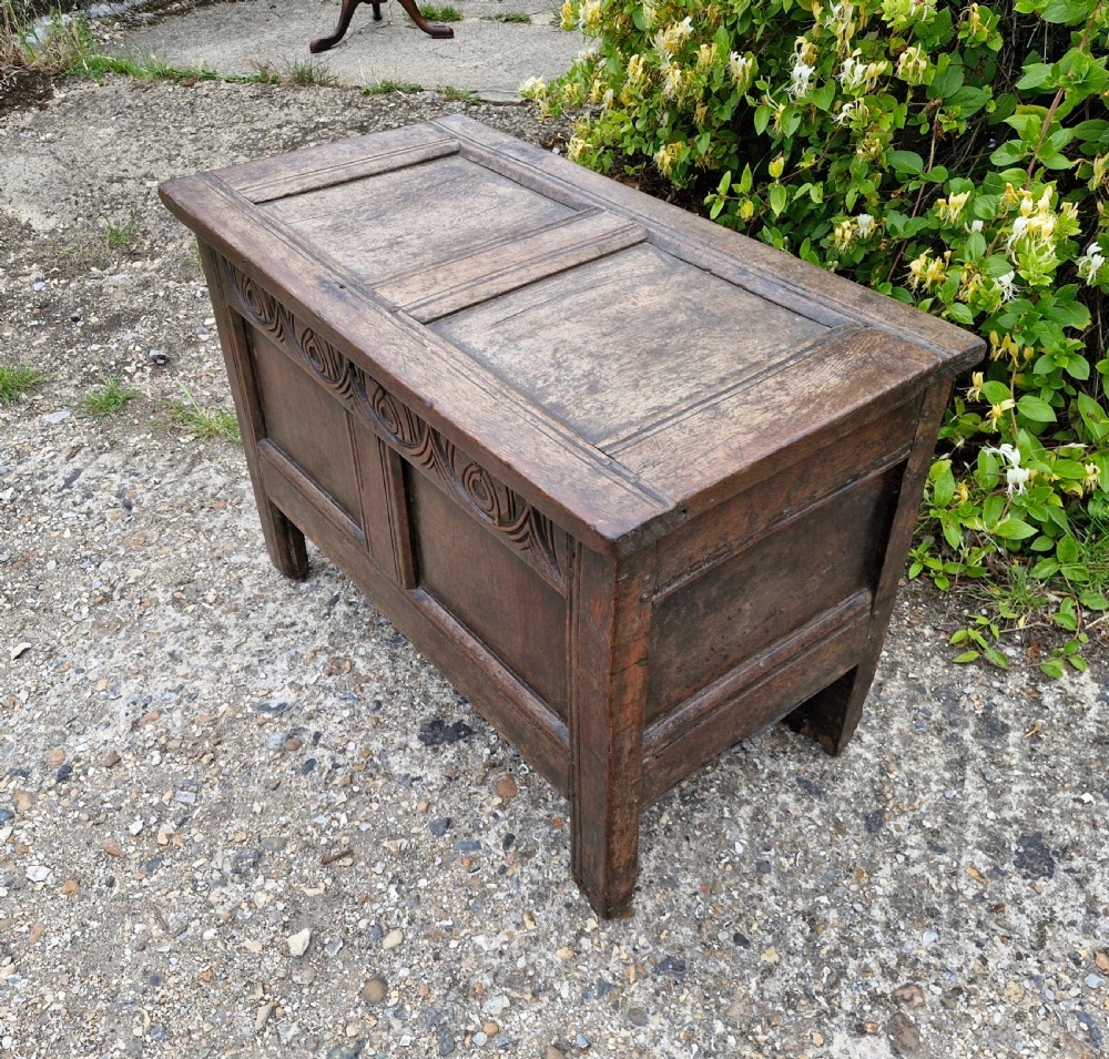 Small late 17th century panelled oak coffer chest.  View V