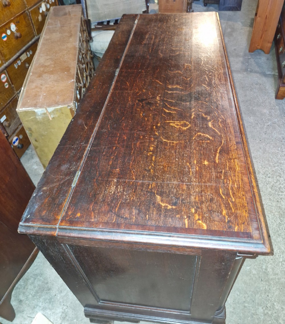 Small late Georgian oak and cross banded Lancashire mule chest.  View III