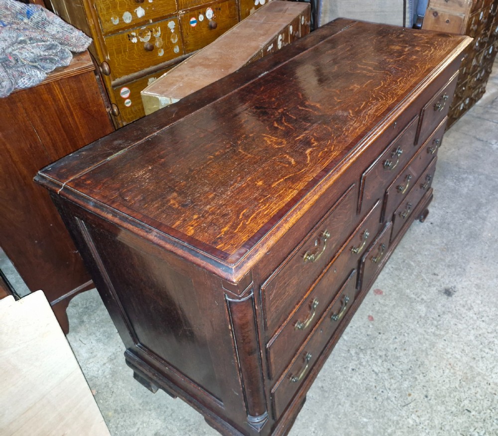Small late Georgian oak and cross banded Lancashire mule chest.  View VI