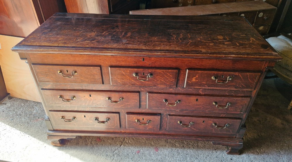 Small late Georgian oak and cross banded Lancashire mule chest.  View VII