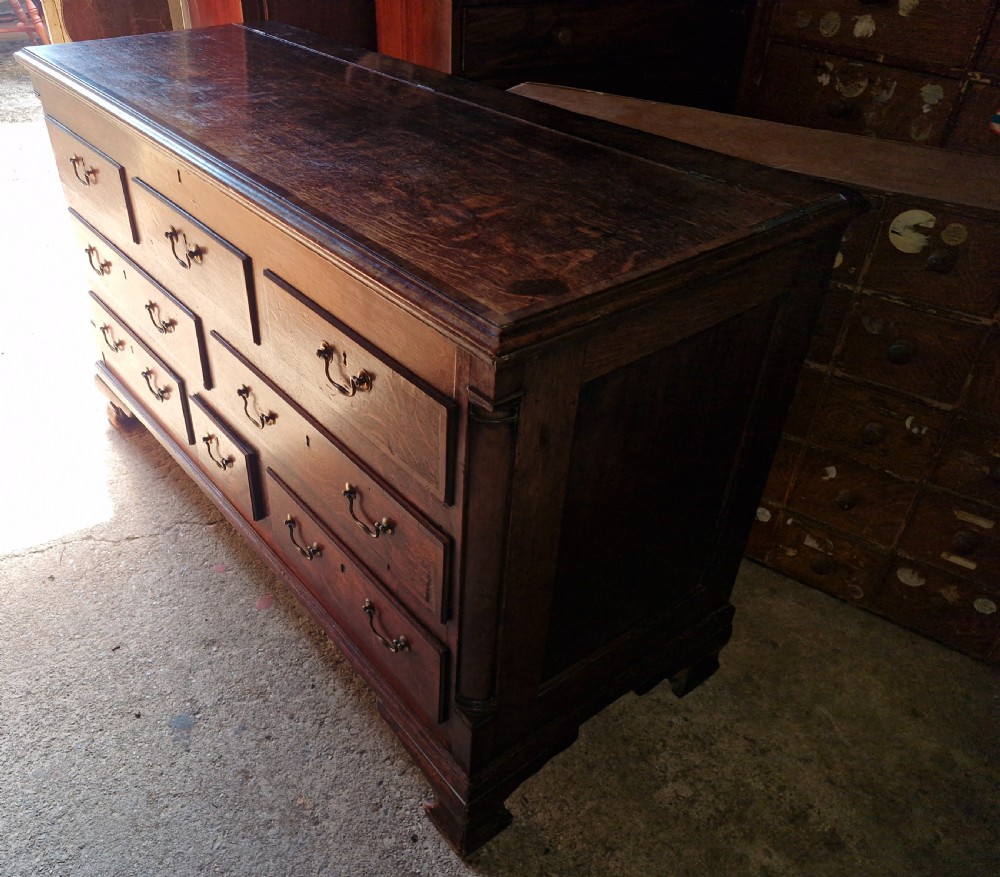 Small late Georgian oak and cross banded Lancashire mule chest.  View VIII