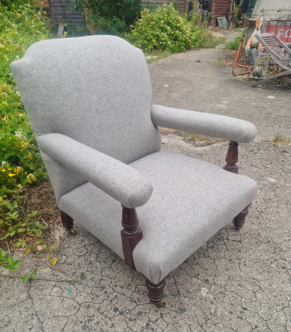 Victorian upholstered armchair with stamp to back leg. View III