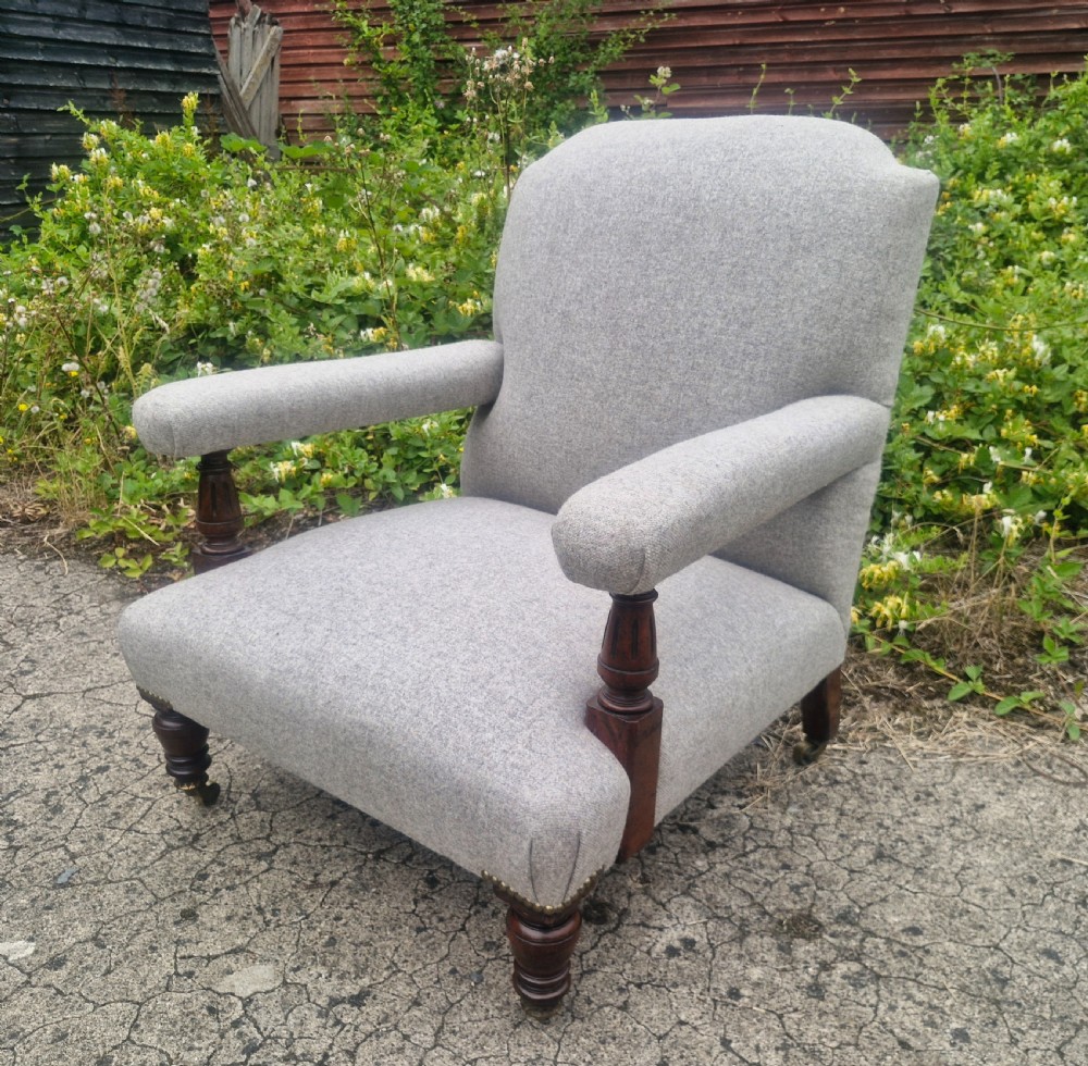 Victorian upholstered armchair with stamp to back leg. View IV