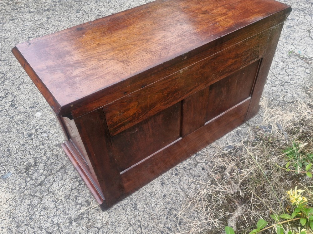 A 19th-century Victorian wooden tabletop Amberg filing cabinet with indexed drawers and an upper spring-loaded letter binder. View II