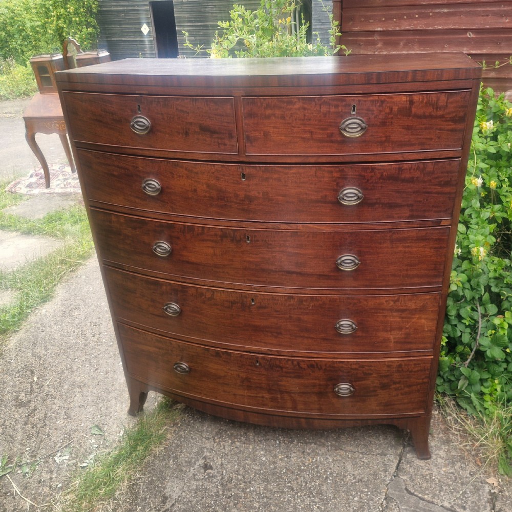 Large Regency mahogany bow front chest of drawers. 