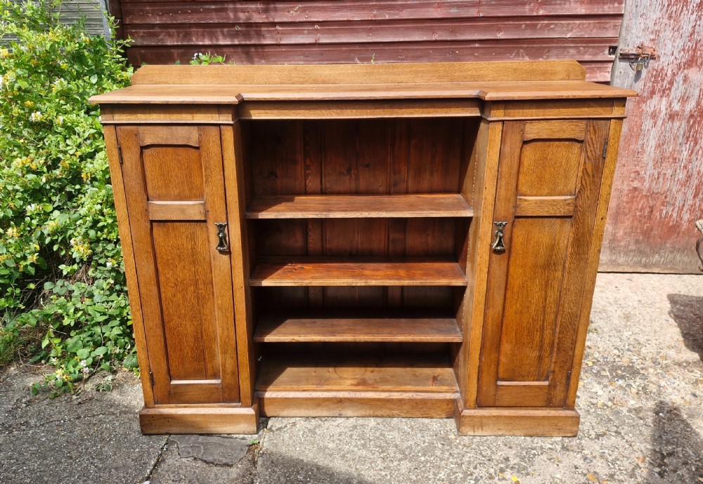 Edwardian oak bookcase cabinet with adjustable shelves  