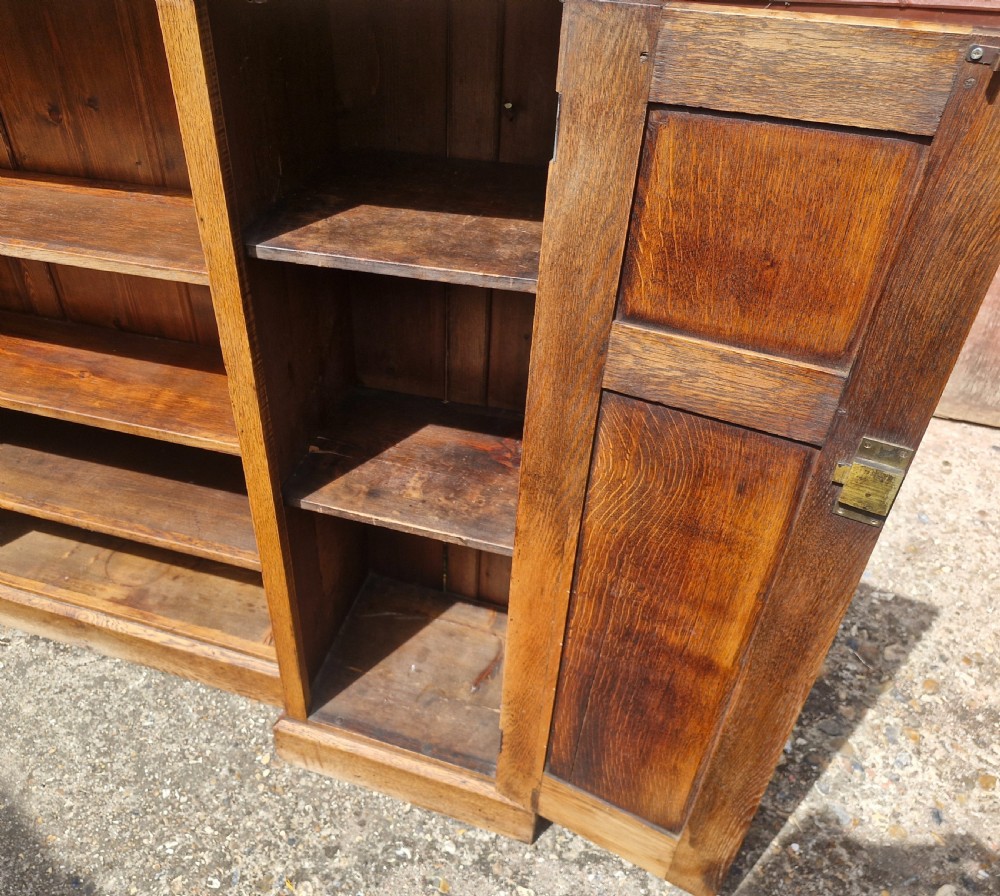 Edwardian oak bookcase cabinet with adjustable shelves   View III
