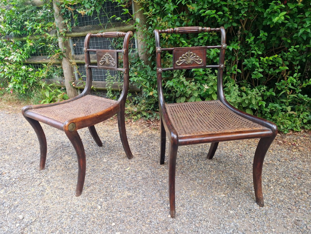 Pair of Regency brass mounted cane seat bedroom chairs. 