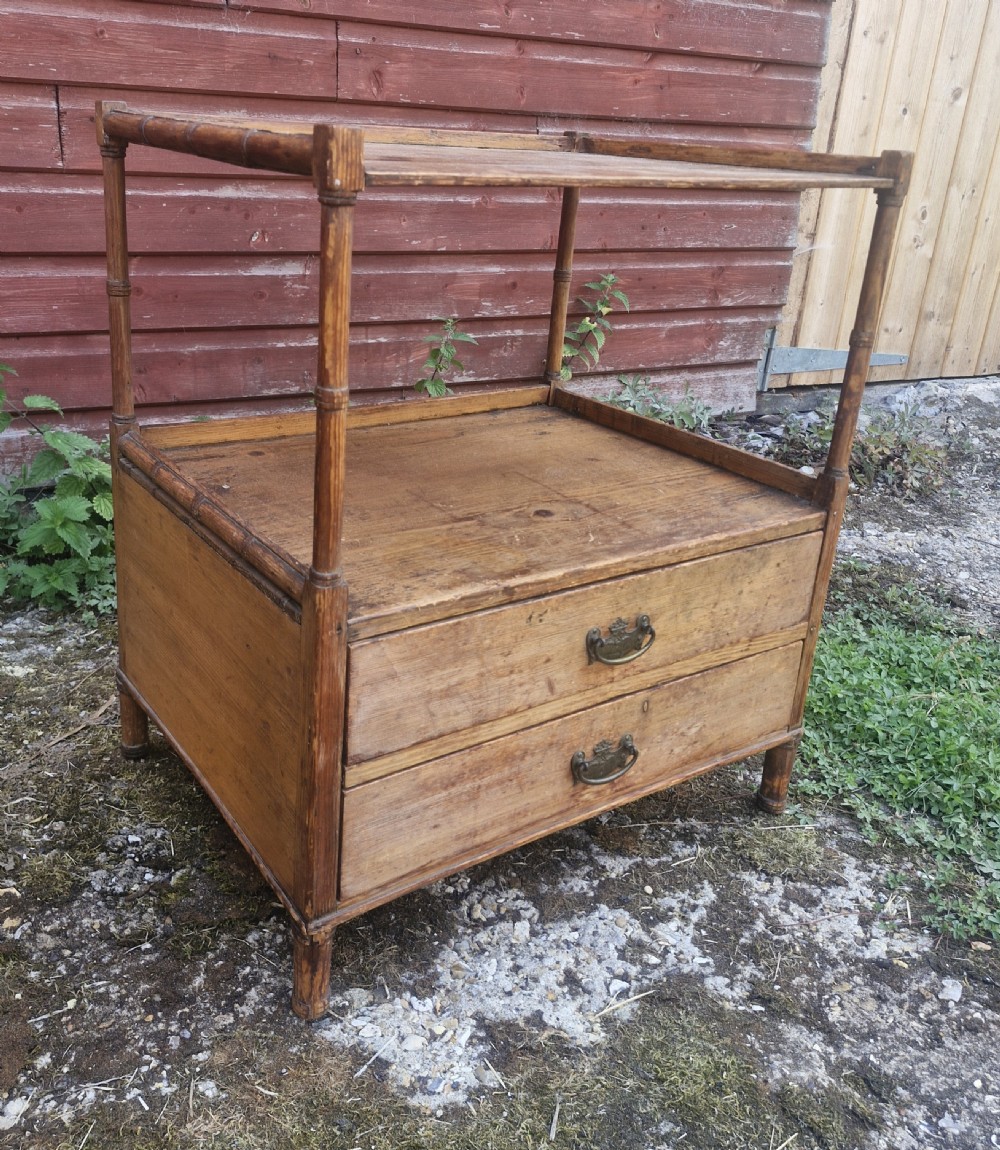 Regency pine 2 drawer side table with bamboo applied mouldings.