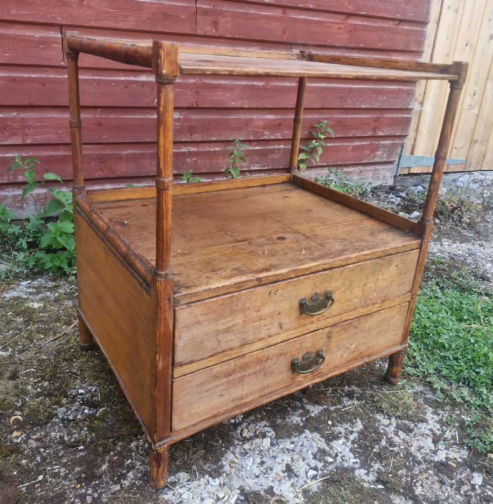 Regency pine 2 drawer side table with bamboo applied mouldings. View II