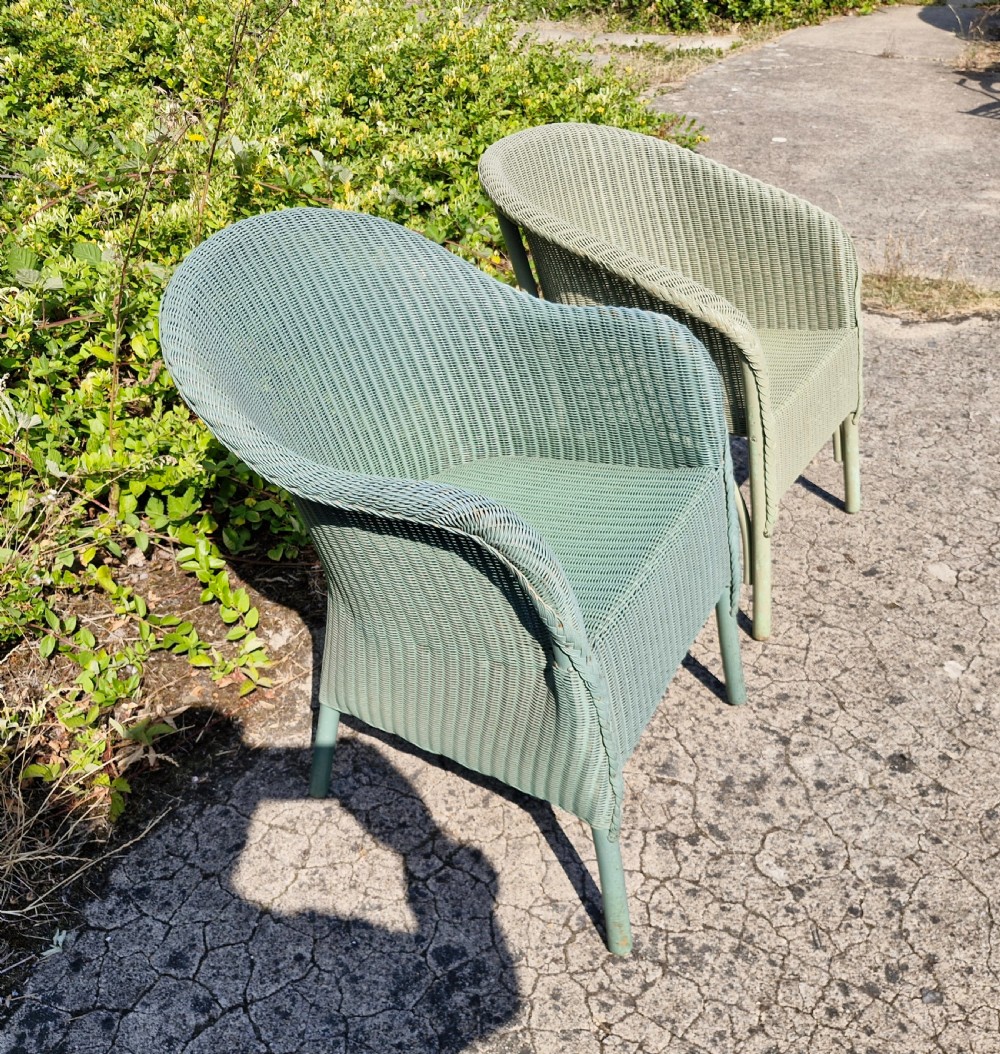 Pair of matched Lloyd Loom armchairs. View II