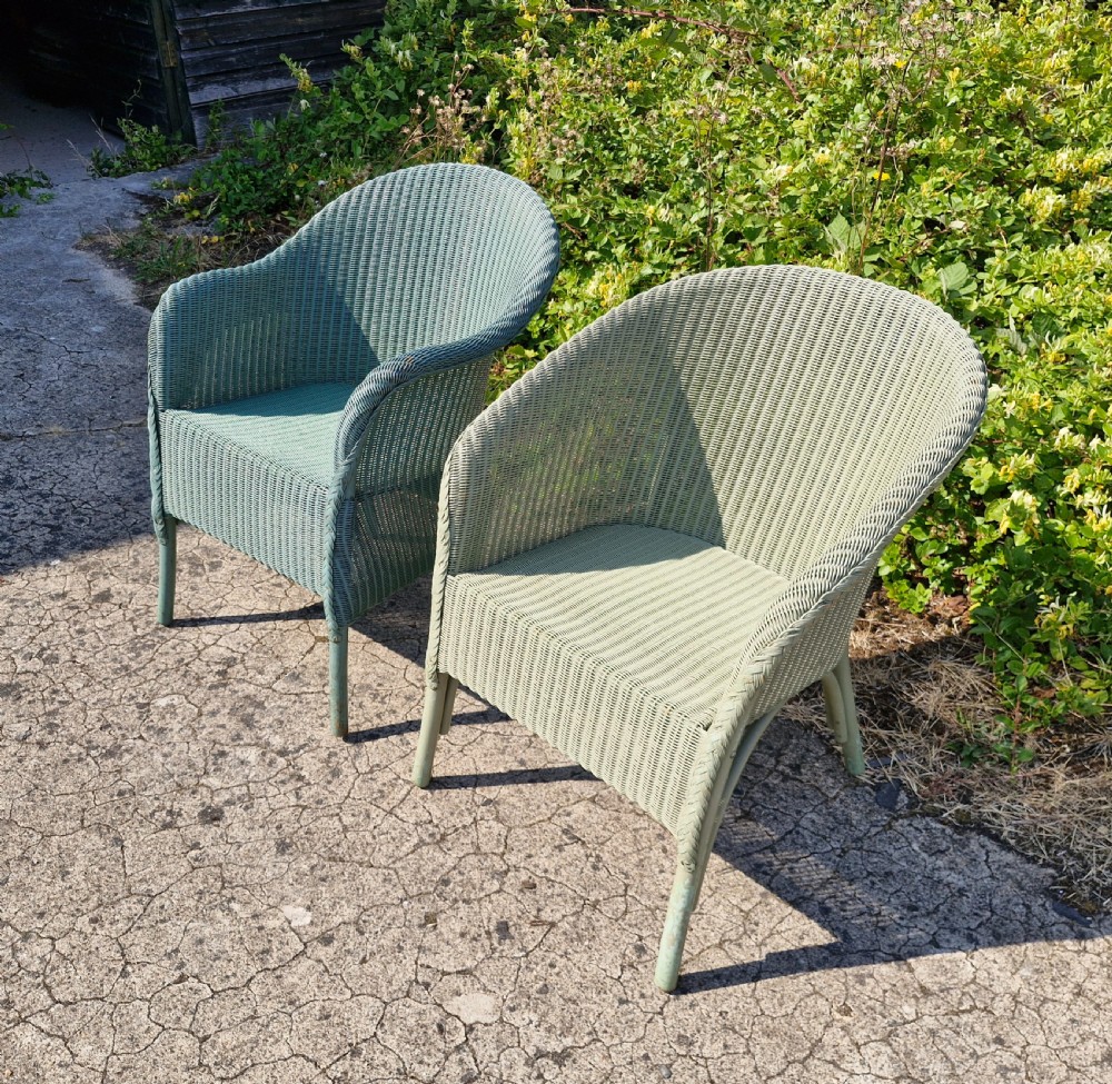 Pair of matched Lloyd Loom armchairs. View III