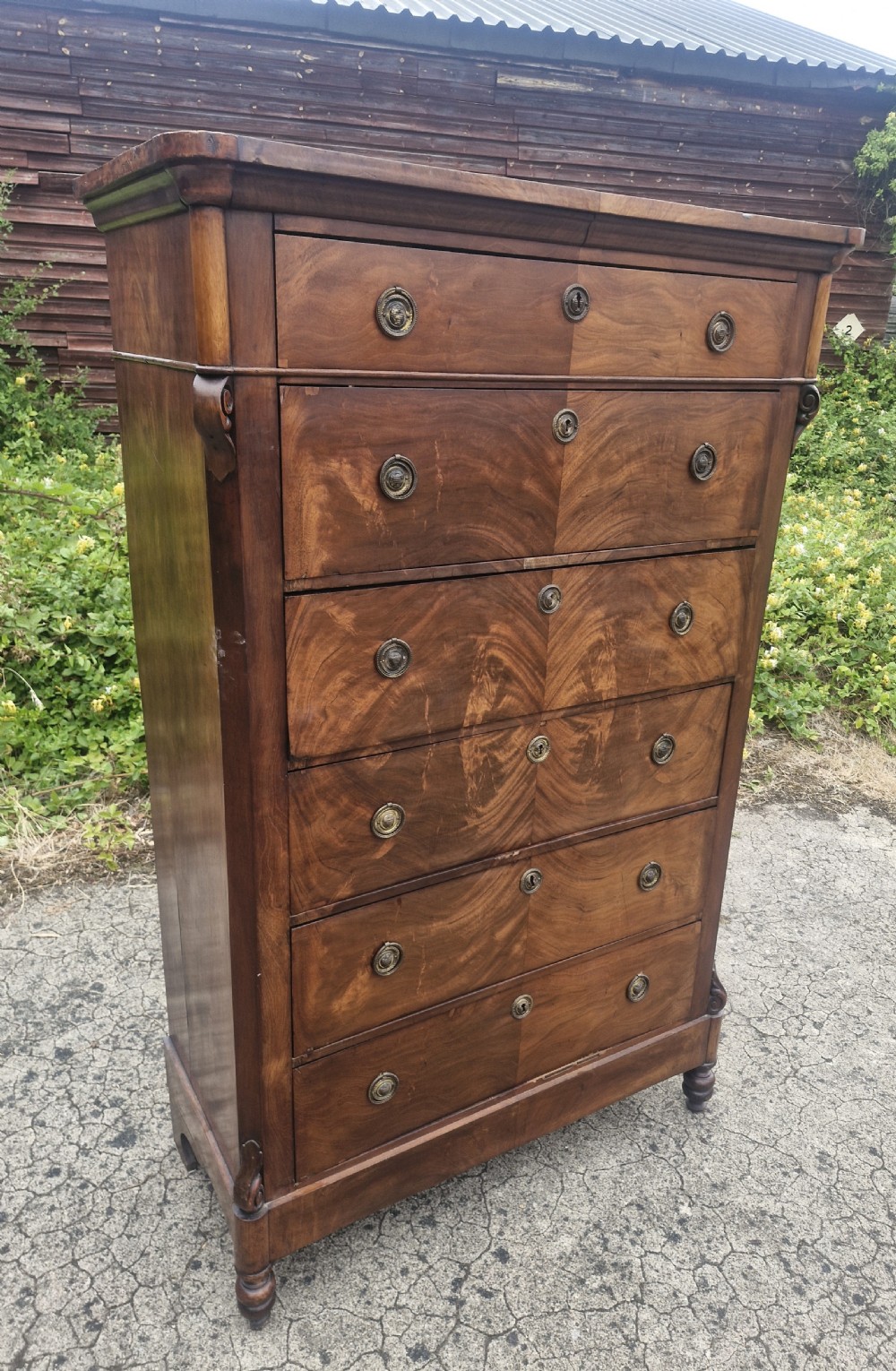 French mahogany chest of drawers with secretaire drawer. 