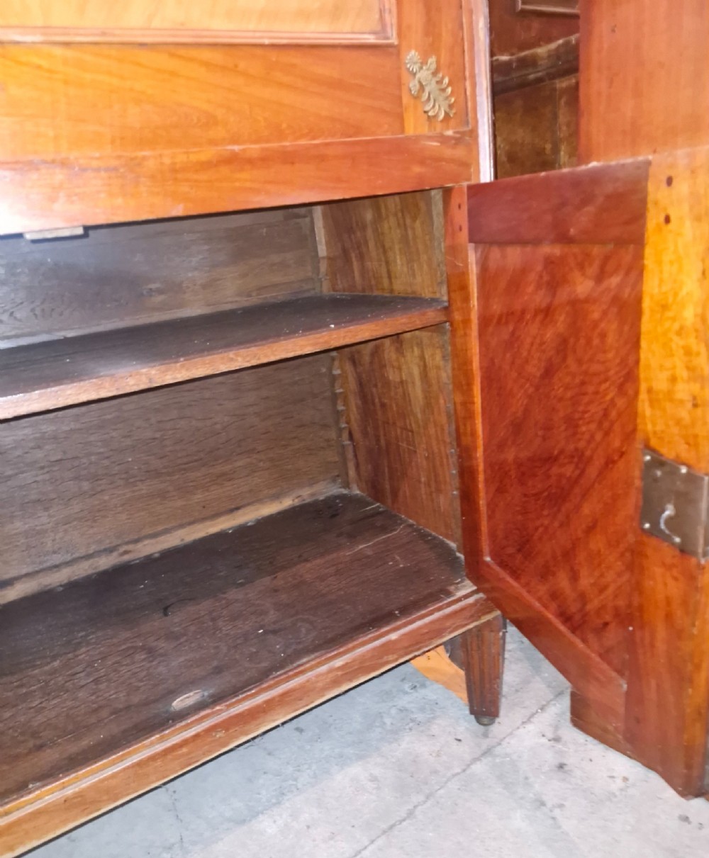 Antique mahogany secretaire cocktail cabinet featuring chevron wood veneer inlays, brass corner mounts, drop-front panel, upper drawer, and lower double doors. View VII