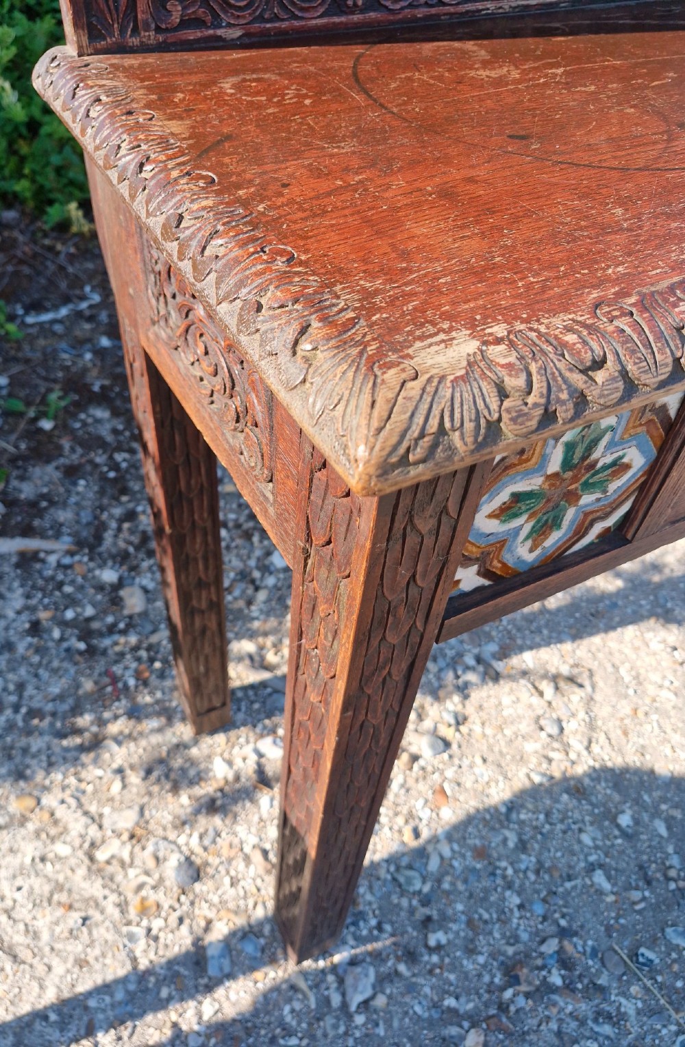 Late Victorian oak 2 drawer side table with decorative tiles. View II