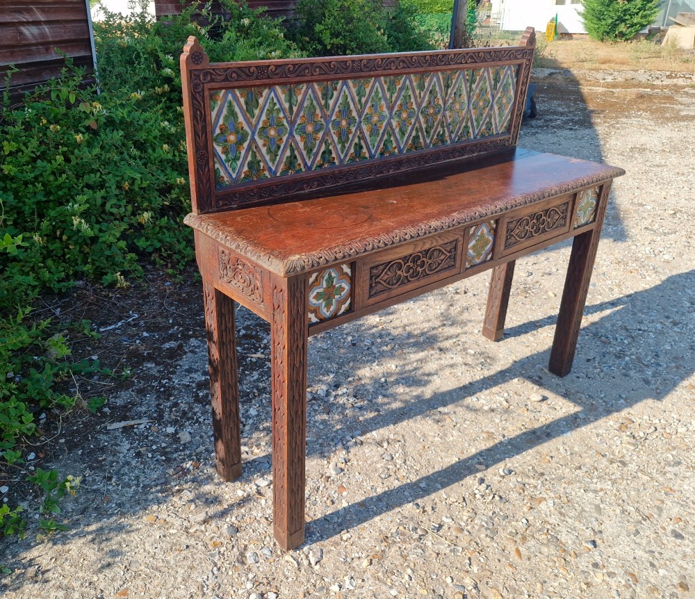 Late Victorian oak 2 drawer side table with decorative tiles. View III