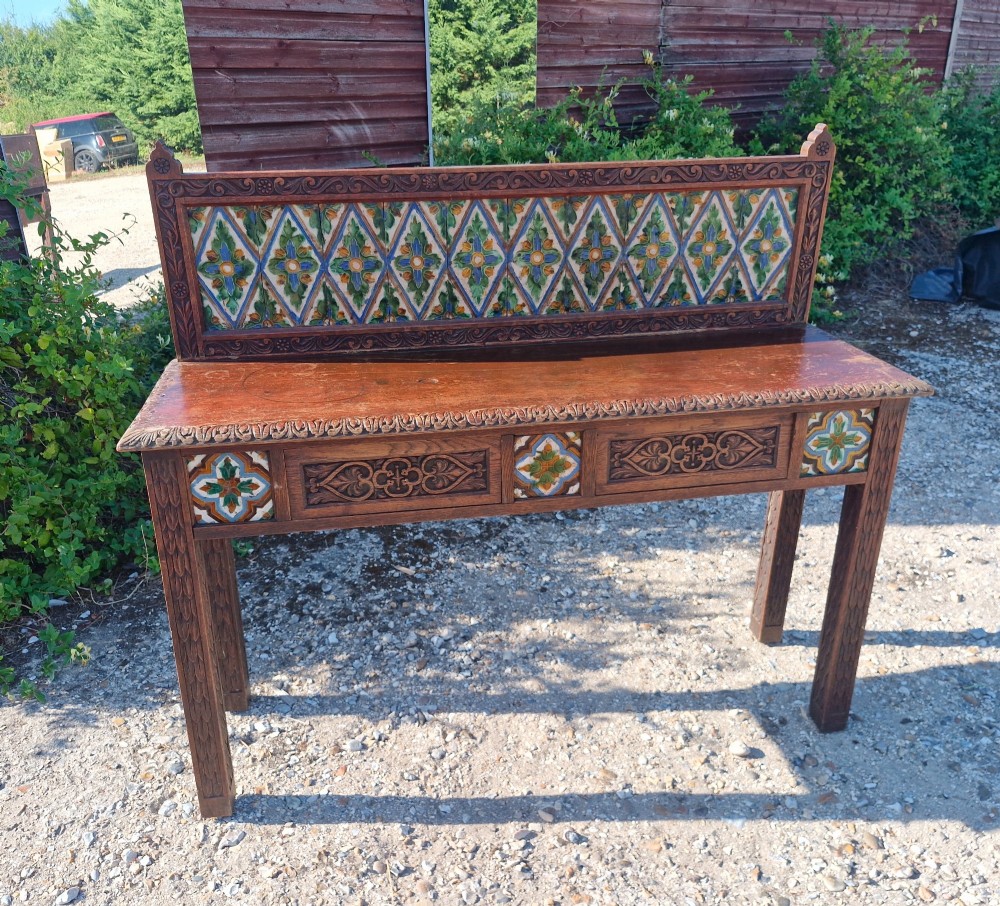 Late Victorian oak 2 drawer side table with decorative tiles. View VII