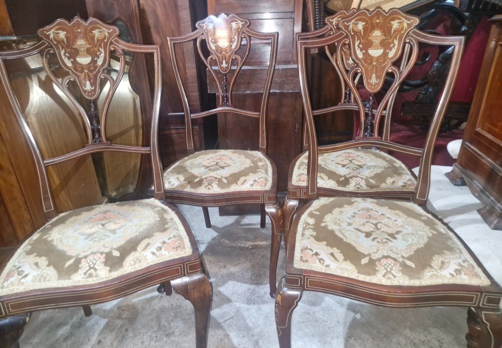A set of four Edwardian mahogany side chairs featuring inlaid vasiform splats, cabriole front legs, and pattern-upholstered seats. View III
