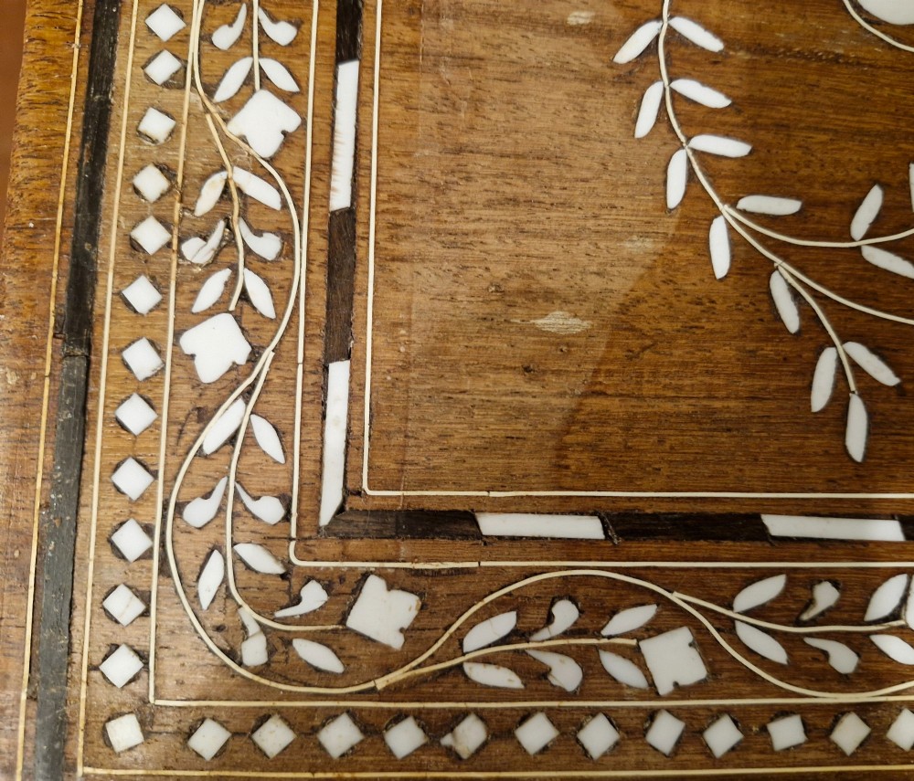 A rectangular warm brown hardwood table featuring detailed white bone inlay depicting the Taj Mahal surrounded by floral borders and curved inlaid legs. View XII