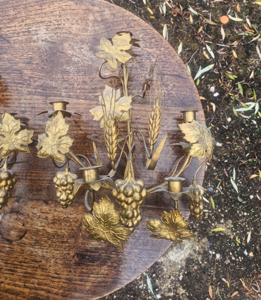 A pair of gilt metal wall candelabra featuring vine leaves, clusters of grapes, and ears of wheat with multiple candle sockets. View IV