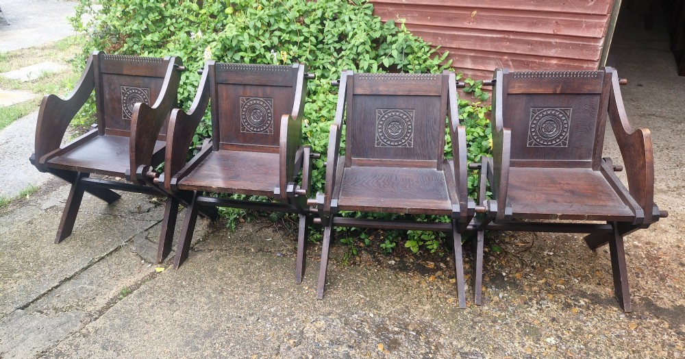 Set of 4 oak Glastonbury oak armchairs.
