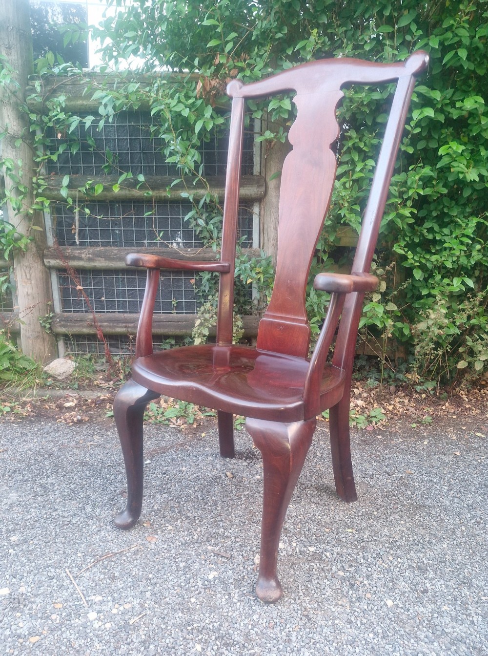 A high-backed solid mahogany armchair featuring a contoured vasiform splat back, shaped armrests, solid timber seat, and cabriole front legs. View XII