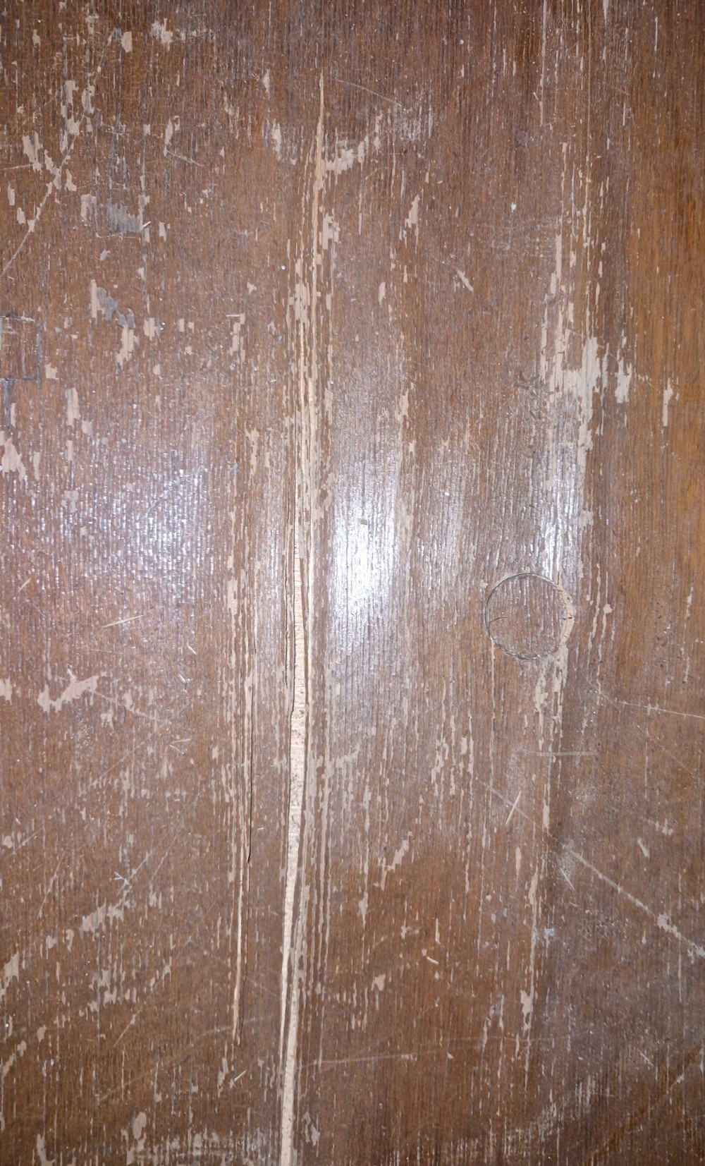A tall wooden bank of drawers featuring sixty-six shallow drawers with metal cup handles and label holders. View XI