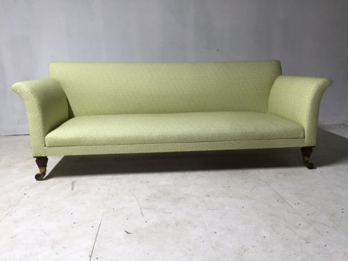 A Pair of Large Simulated Rosewood Sofas