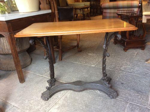 19th C Mahogany Top Table on Cast Iron Base.