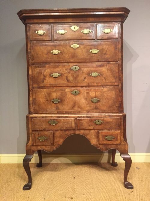 A George I Walnut Chest on Stand