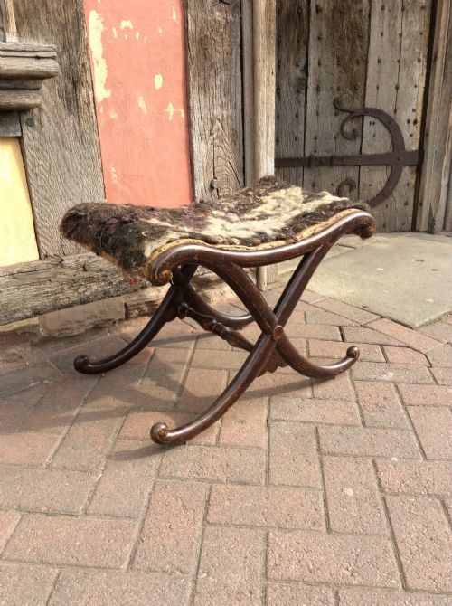 Regency Simulated Rosewood X Shaped Stool.