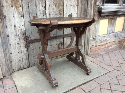 An Arts & Crafts Gothic Revival Oak Table