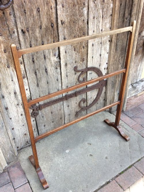 An Edwardian English Walnut  Towel Rail