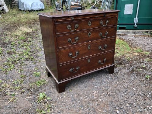 An 18thc Mahogany Chest of Drawers with Brushing Slide