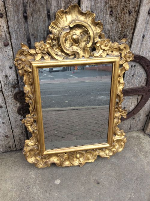 An 18thc Italian Carved & Gilded Mirror