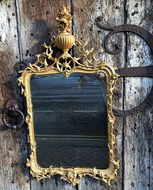 An 18thc  Continental Carved and Gilded Mirror